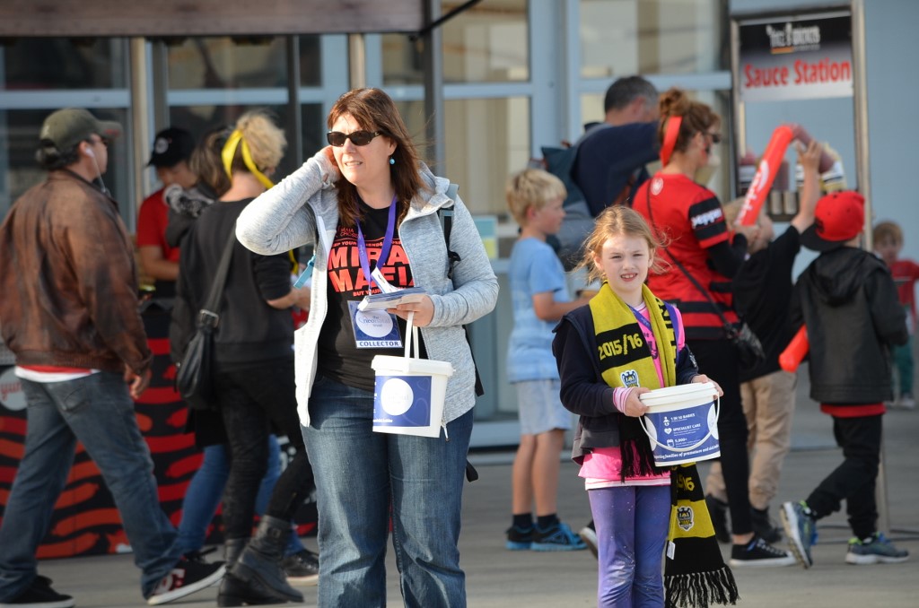 Kaye and CJ Collecting for The Little Miracles Trust